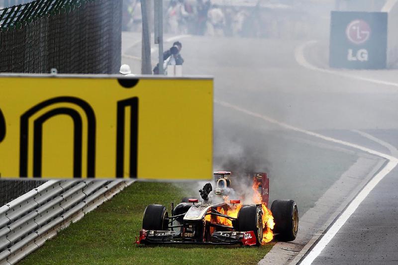 Nick Heidfeld (GER) Lotus Renault GP R31 retires with a fire. Formula One World Championship, Rd 11, Hungarian Grand Prix, Race, Budapest, Hungary, Sunday, 31 July 2011