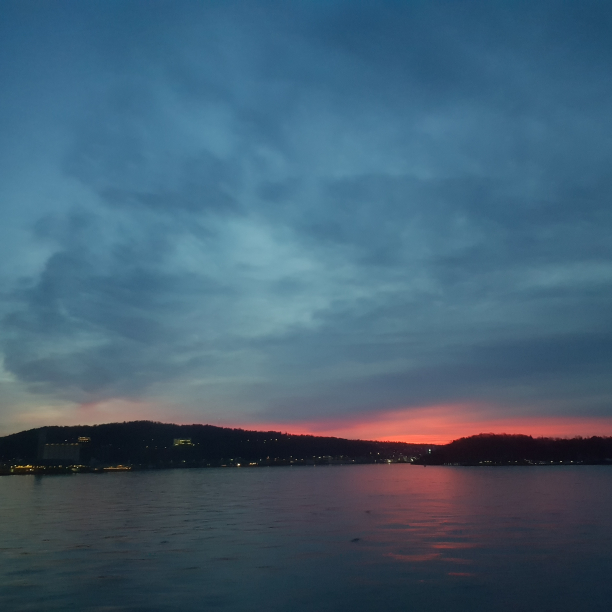 Hello, Friday. A orange sunrise on the fjord.