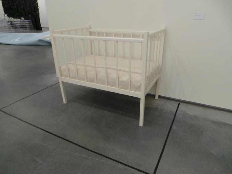 Robert Gober. Crib, 1986. Oil on wood, cotton mattress