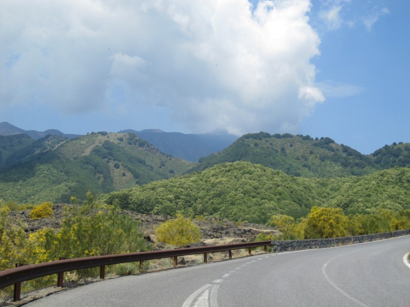 Etna is somewhere behind these hills.