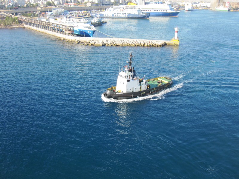 A tug boat was always close by when the Navigator of the Seas docked or departed. If the engines fail there are a lot of tonnage that has to be stopped.