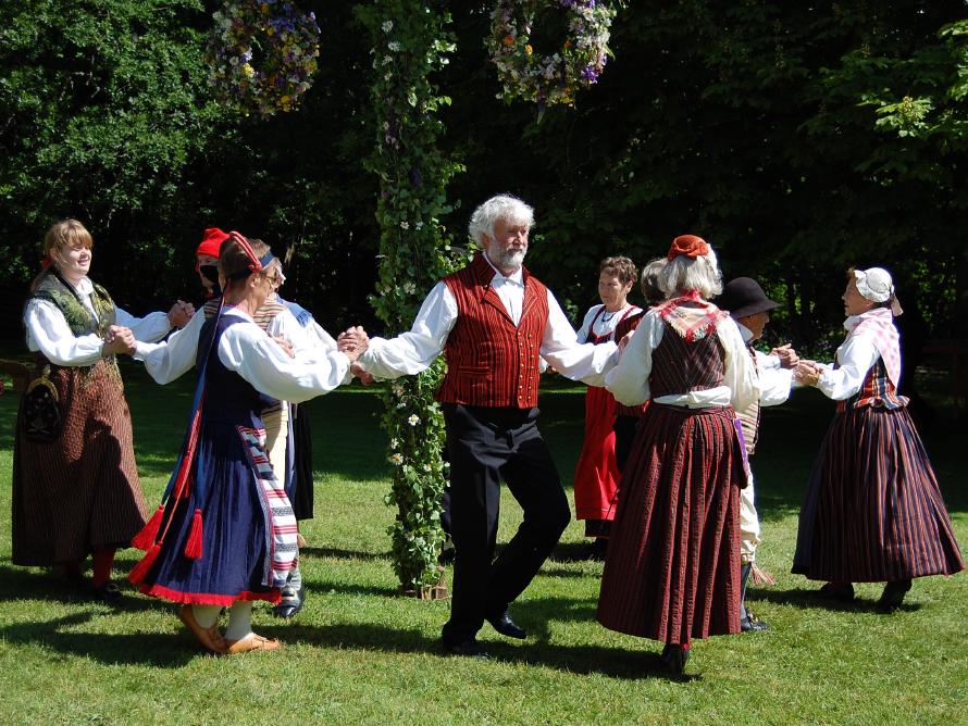 Look at those Swedes, with their cheap energy drinks, prancing around like they own the world. Photo by lilmedia / Pixabay. A bunch of Sweden dancing around the mid summer night pole.