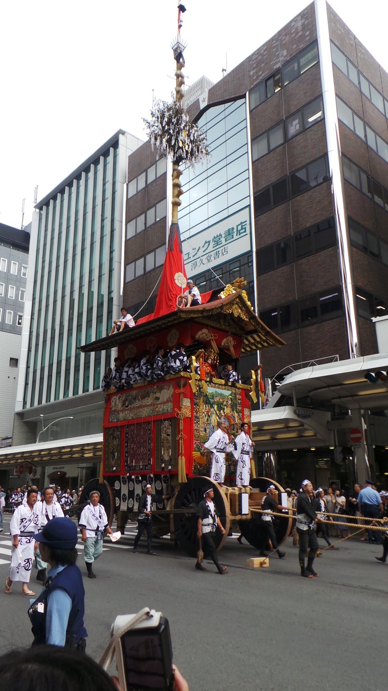 The height often comes from just planting a huge tree on top of the float.