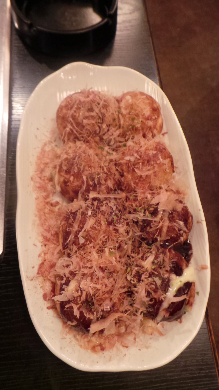 Osaka is famous for its cuisine, here represented by Takoyaki.