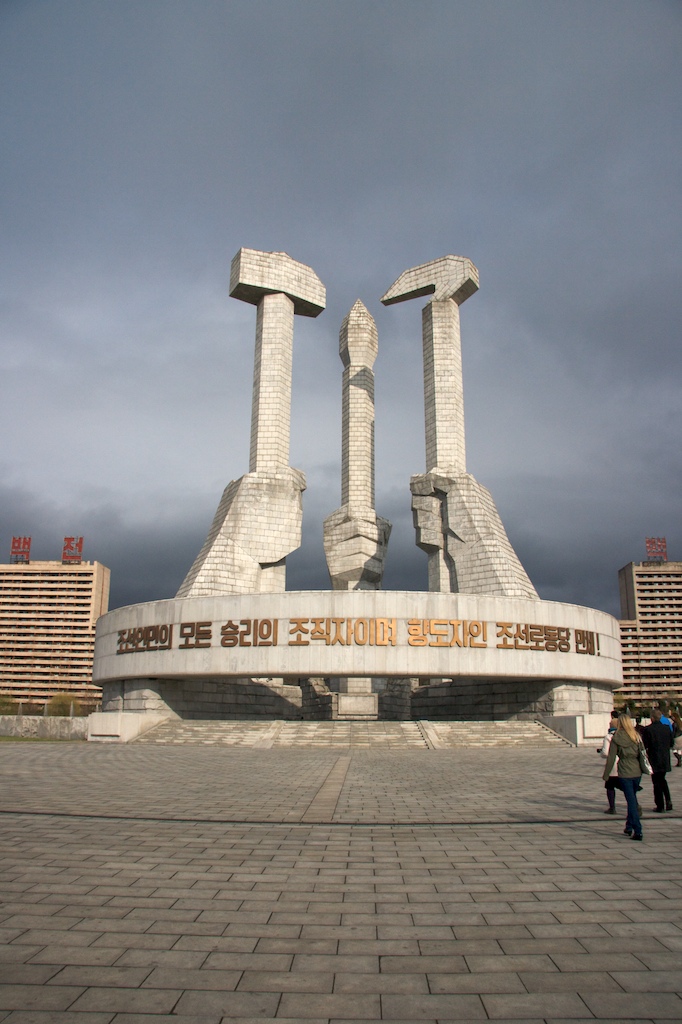 Workers Party of Korea Monument. Kim Il-sung didn&rsquo;t mind the intellectuals and they are represented by a hand holding a pencil in the middle of the monument.