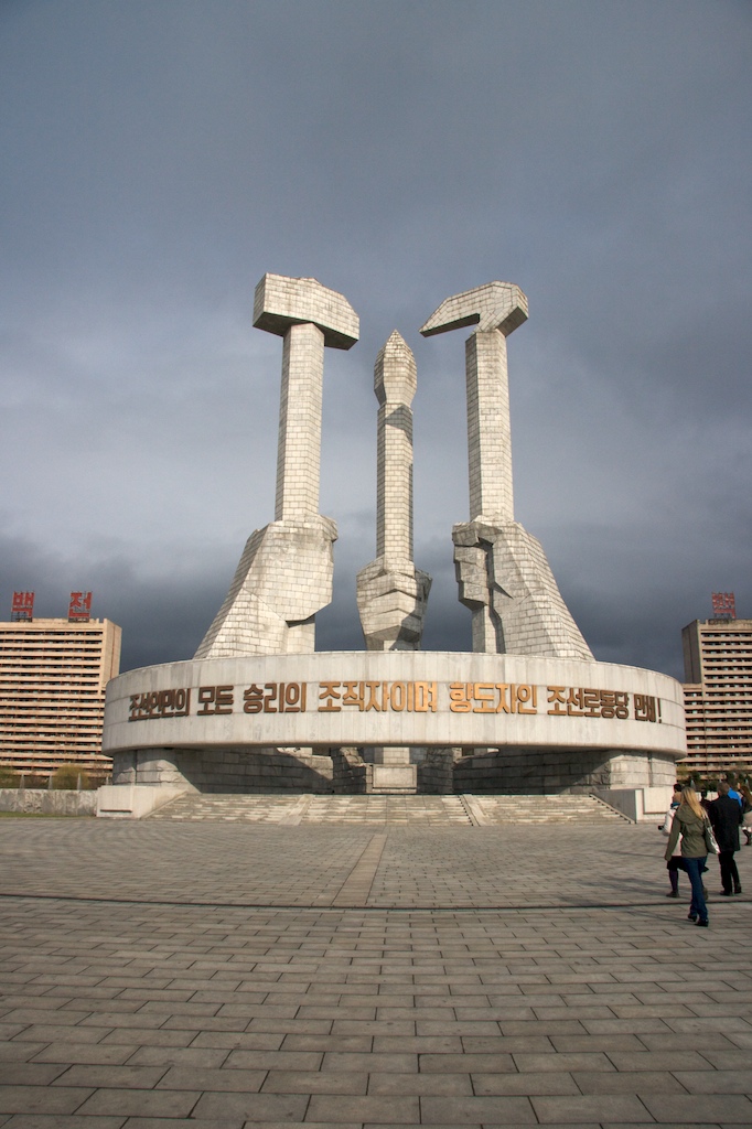 Workers Party of Korea Monument. Kim Il-sung didn’t mind the intellectuals and they are represented by a hand holding a pencil in the middle of the monument.