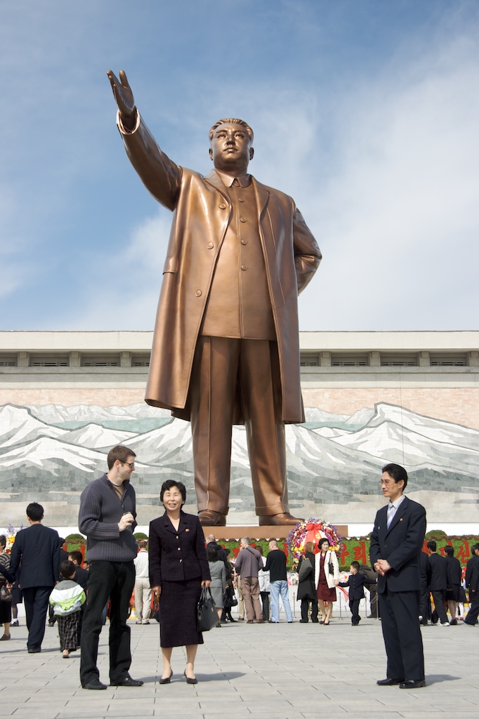 A 50 meter tall statue of Kim Il-sung with a monstrous mosaic in the background. The North Koreans love their mosaics.