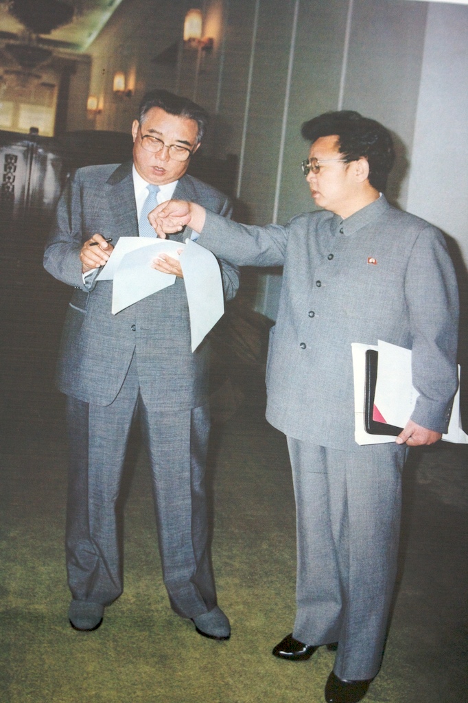 Kim Il-Sung and Kim Jong-il. Not surprisingly this is a picture of a picture.