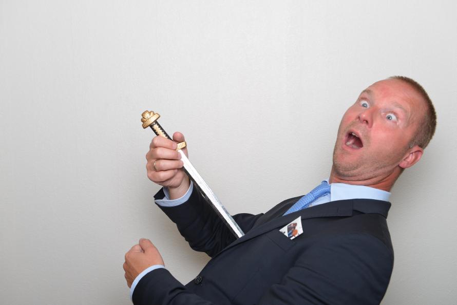 01:35:51 AM, at the photo booth, this happens: A respectable entrepreneur turns into a party entertainer. 01:35:51 AM, at the photo booth., this happens: A respectable entrepreneur turns into a party entertainer.