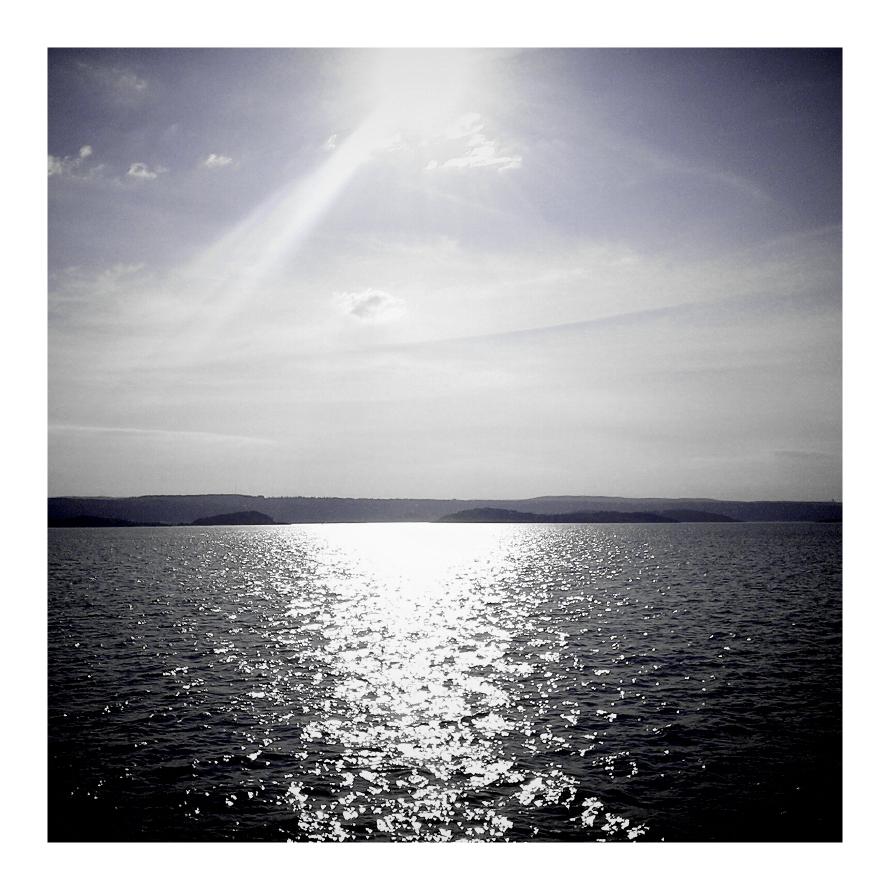 Shot from the boat from Nesoddtangen, early in the morning, Saturday May 26. View of the calm fjord.